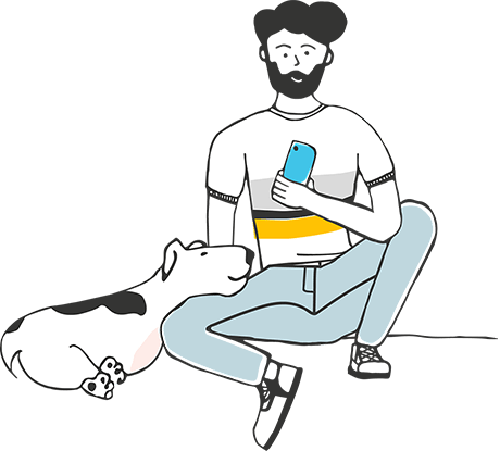 Man sitting with dog and holding mobile phone